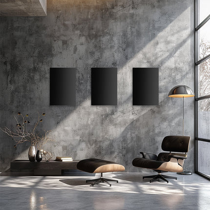 Hermoso loft moderno calentado por tres paneles infrarrojos ECAROS negros en la pared, solución de calefacción elegante y eficiente para un interior con estilo.