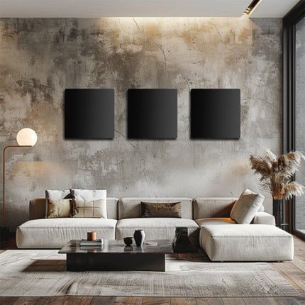 Espacio habitable de diseño calentado por tres paneles infrarrojos en la pared, solución de calefacción elegante y eficiente para un interior moderno.