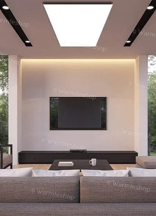 1250 watt Ecaros infrarood verwarmingaan het plafond in de living, biedt efficiënte en stijlvolle verwarming voor een comfortabele woonomgeving.